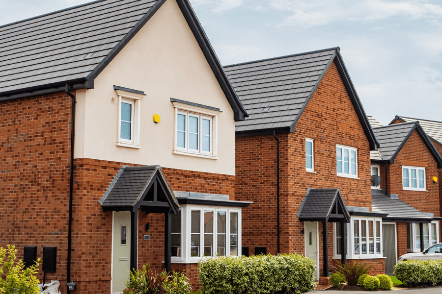 uPVC vs Aluminium Windows: A Guide for Boston Homeowners 2 White casement windows on a new build house
